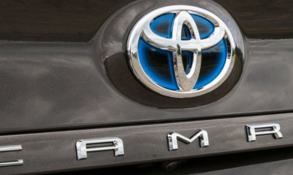 Close Up of 2018 Toyota Camry Hybrid Rear Badge