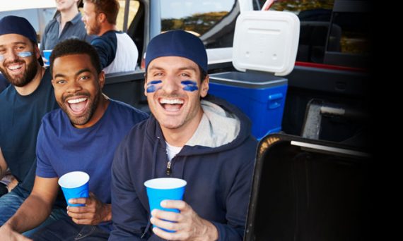 Football fans tailgating before a game