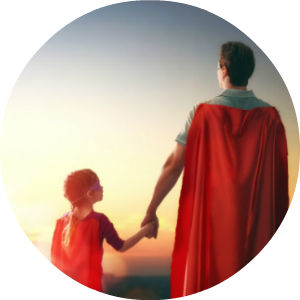 Father and Daughter in Superhero Costumes