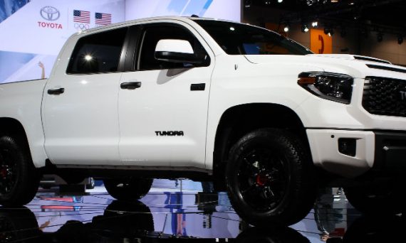 Super White 2019 Toyota Tundra TRD Pro Front and Side Exterior on Stage at Chicago Auto Show