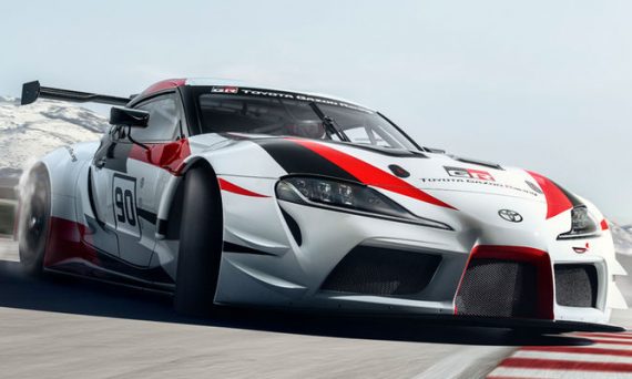 Red, White and Black Toyota GR Supra Concept Front Exterior on Track with Mountains in the Background