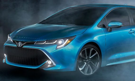 Blue 2019 Toyota Corolla Hatchback Front Exterior on Blacktop with Mist