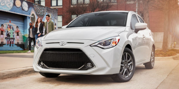 White 2019 Toyota Yaris Sedan Front Exterior on a City Street