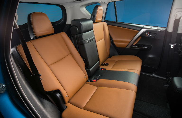 Tan and Black 2018 Toyota RAV4 Hybrid Rear Passenger Seats