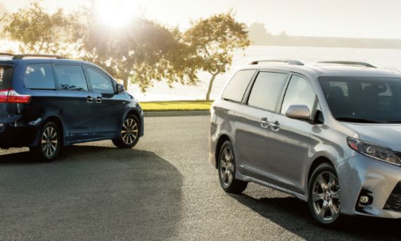 Two 2020 Toyota Sienna minivans parked next to each other